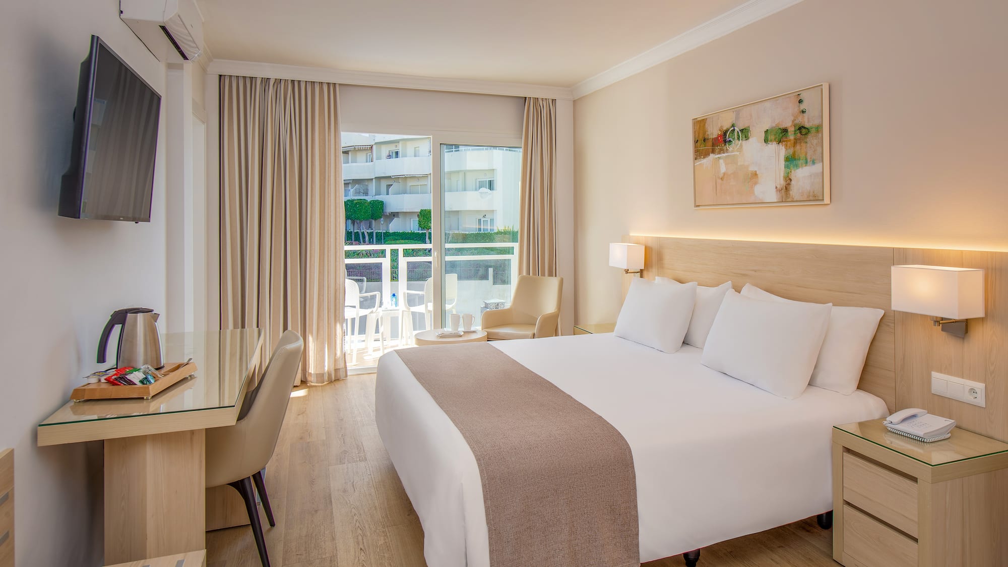 a room with a bed and a desk