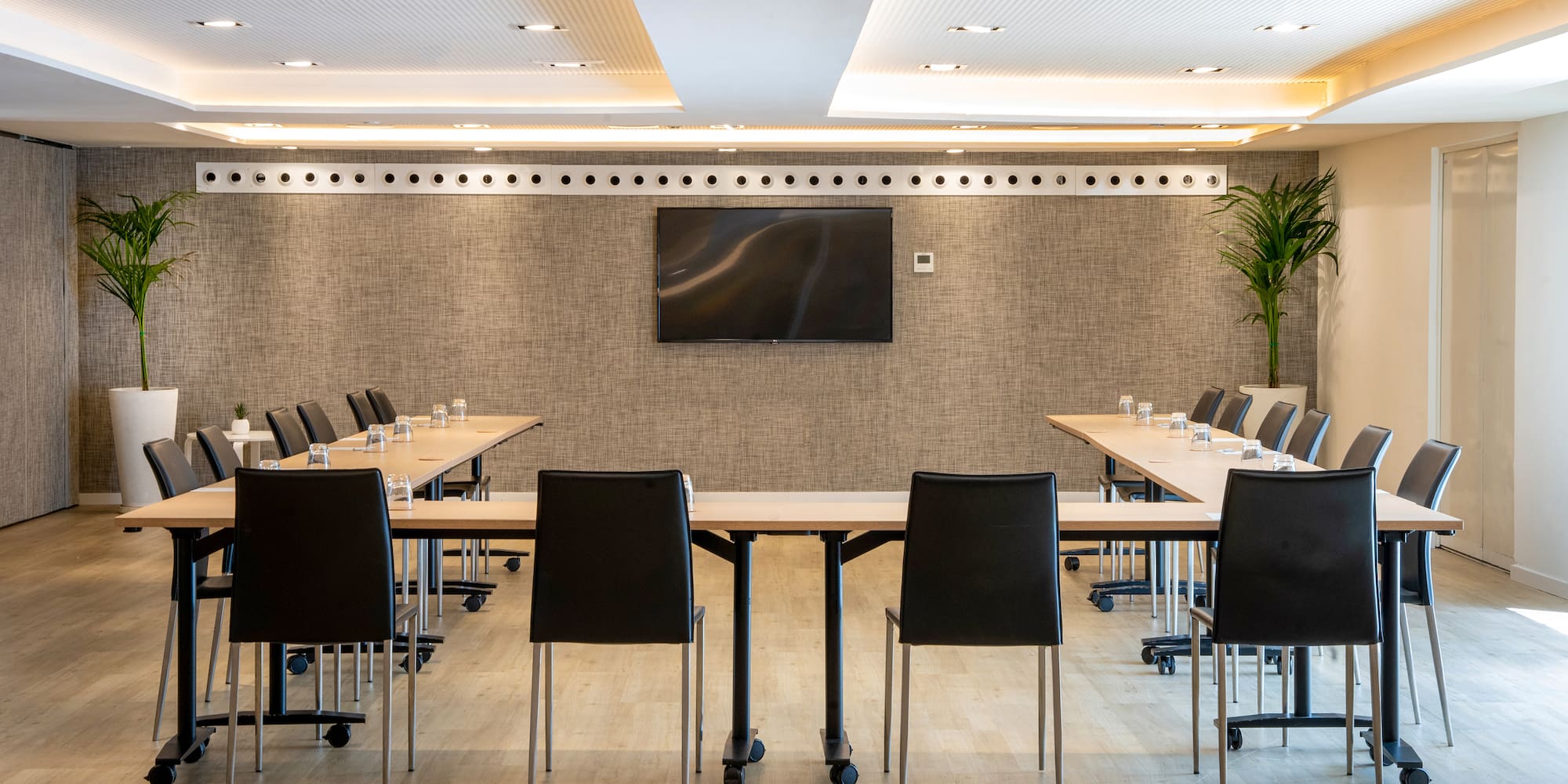 a room with a table and chairs