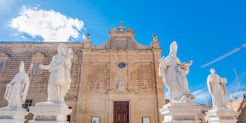 statues outside of a building