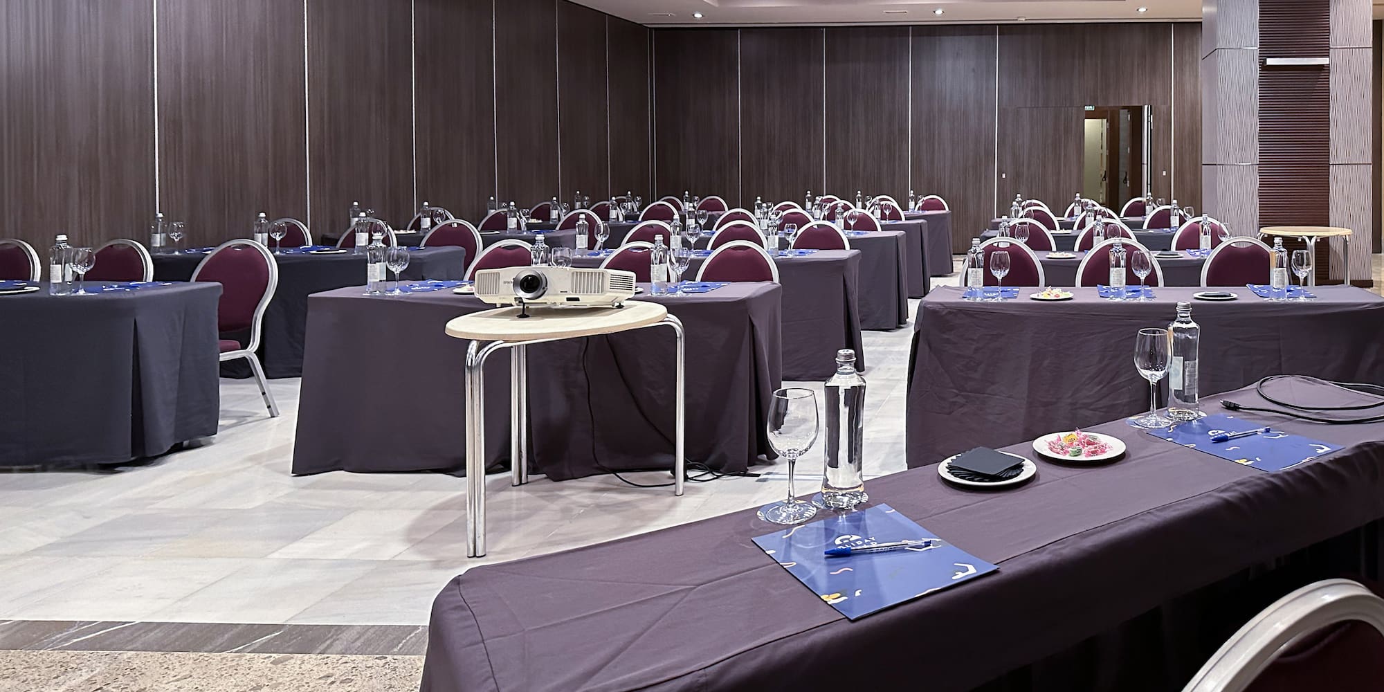 a room with tables and chairs