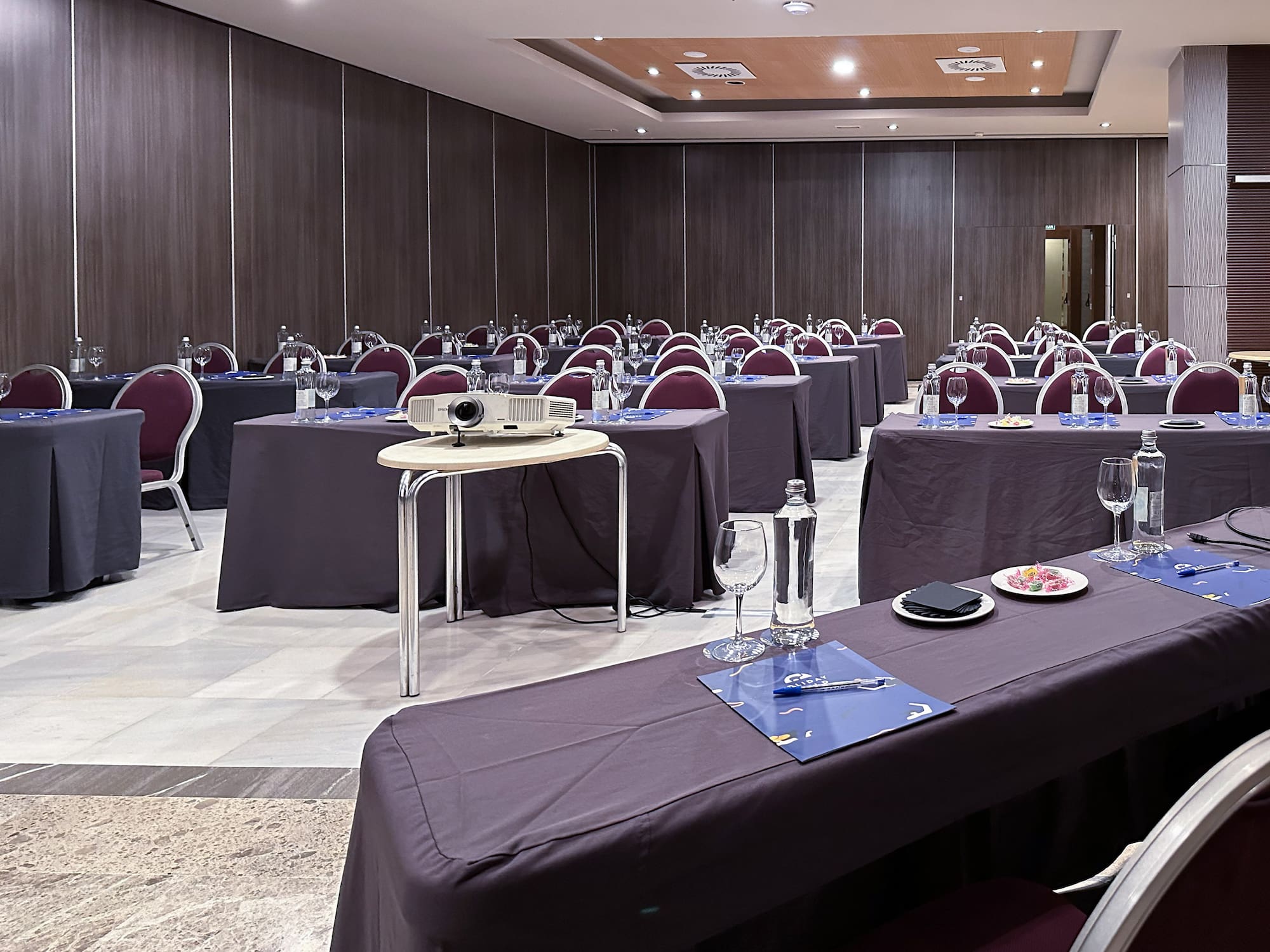 a room with tables and chairs