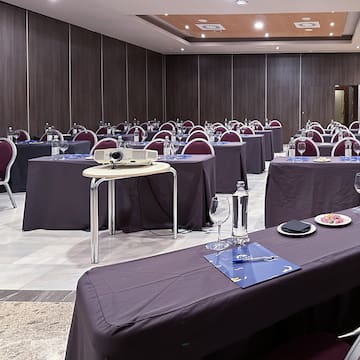 a room with tables and chairs