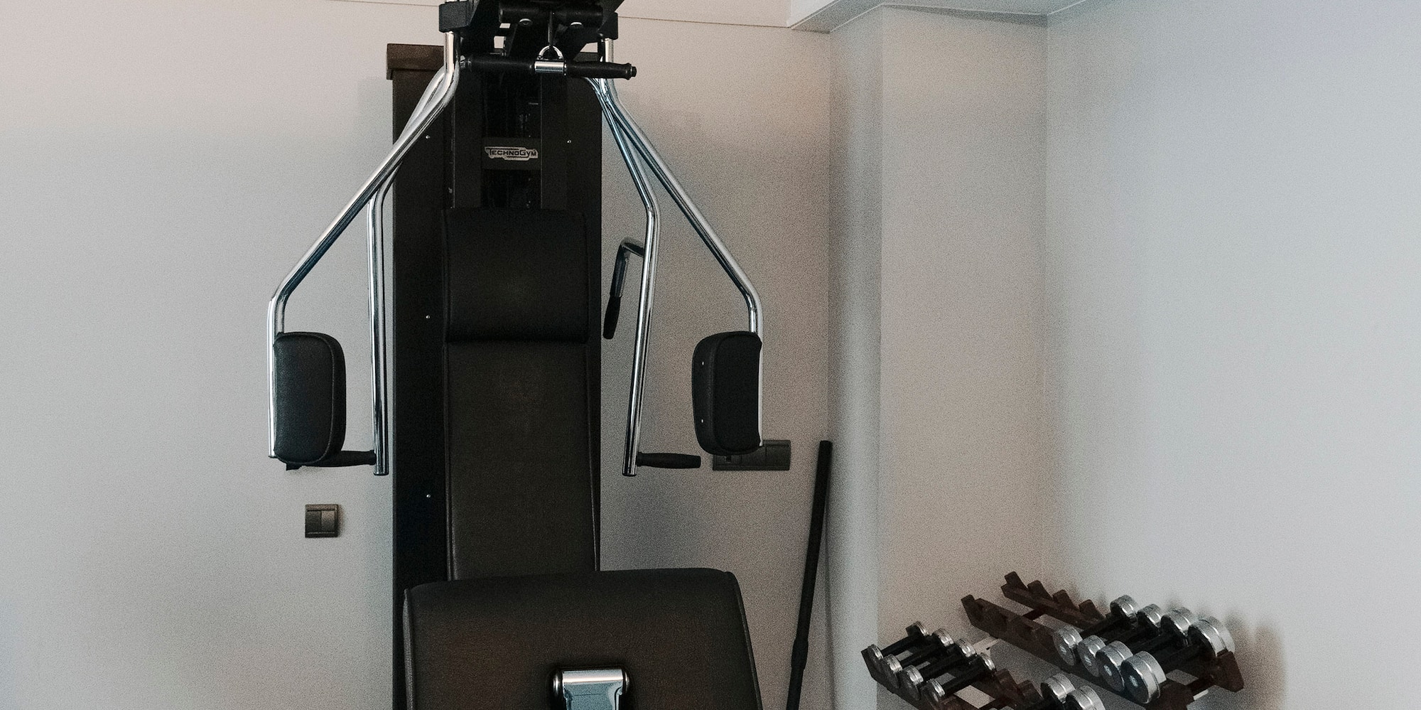 a gym with weights and equipment