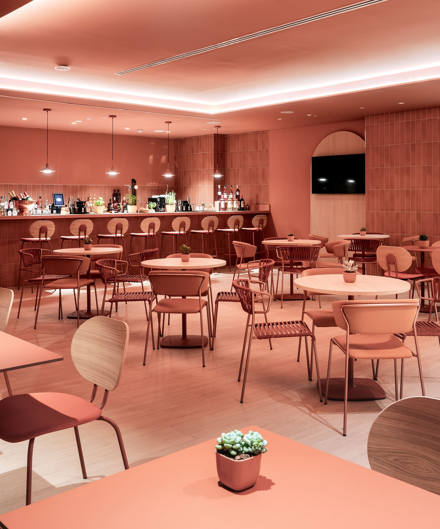 a room with tables and chairs