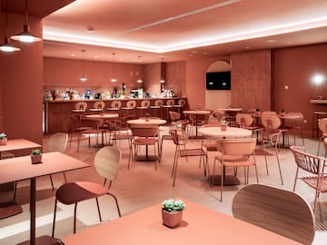 a room with tables and chairs