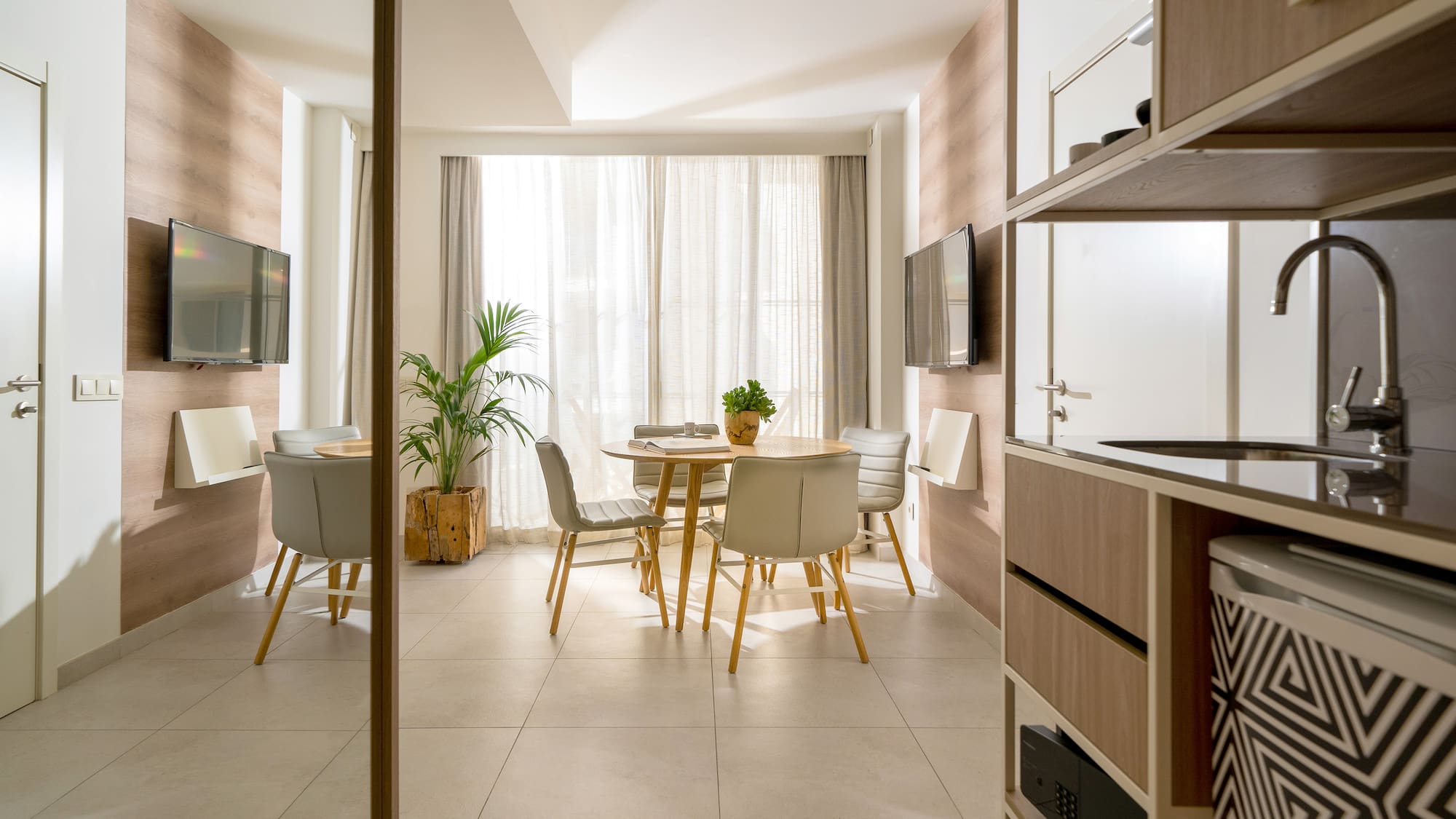 a room with a table and chairs