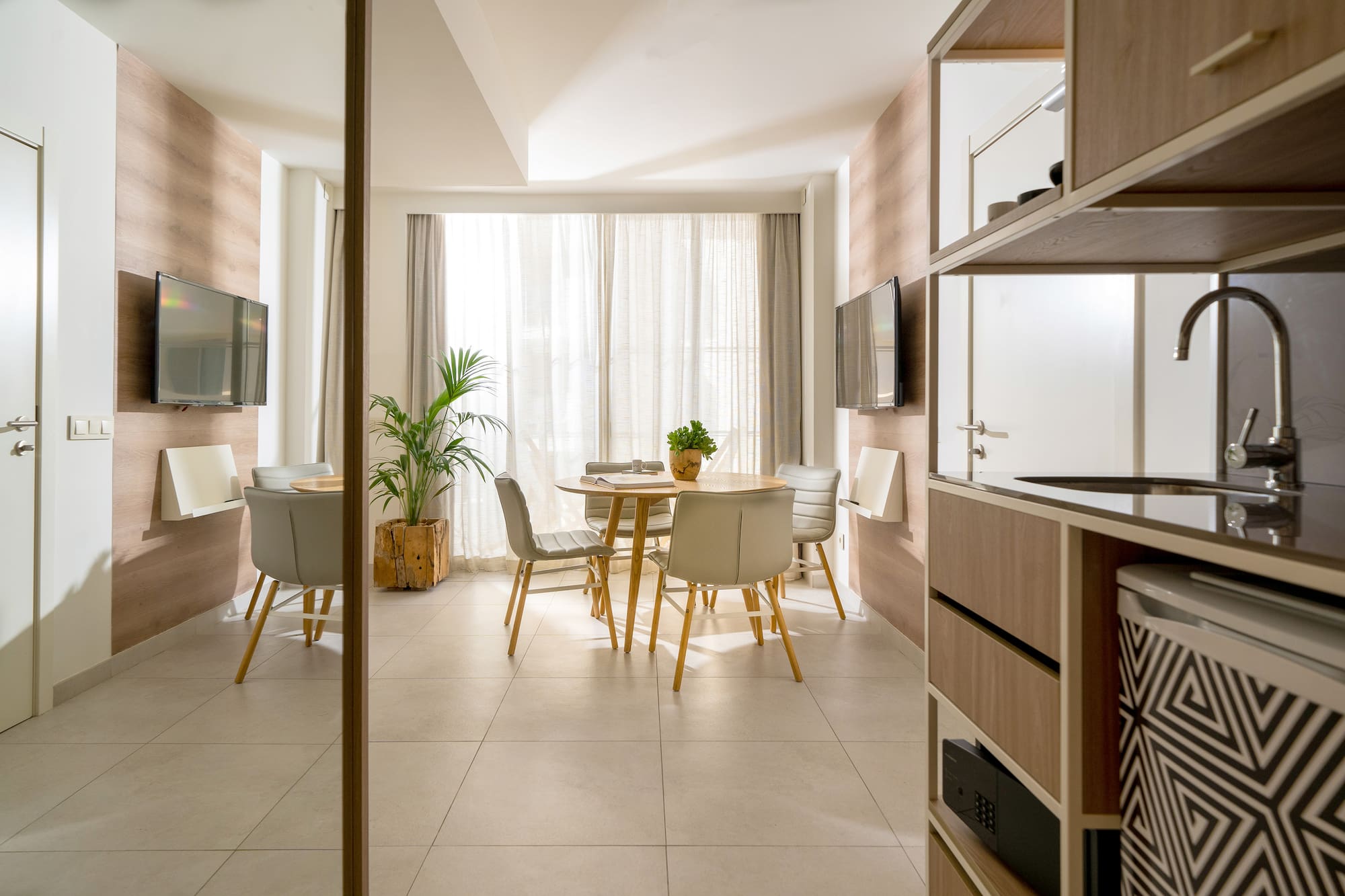 a room with a table and chairs