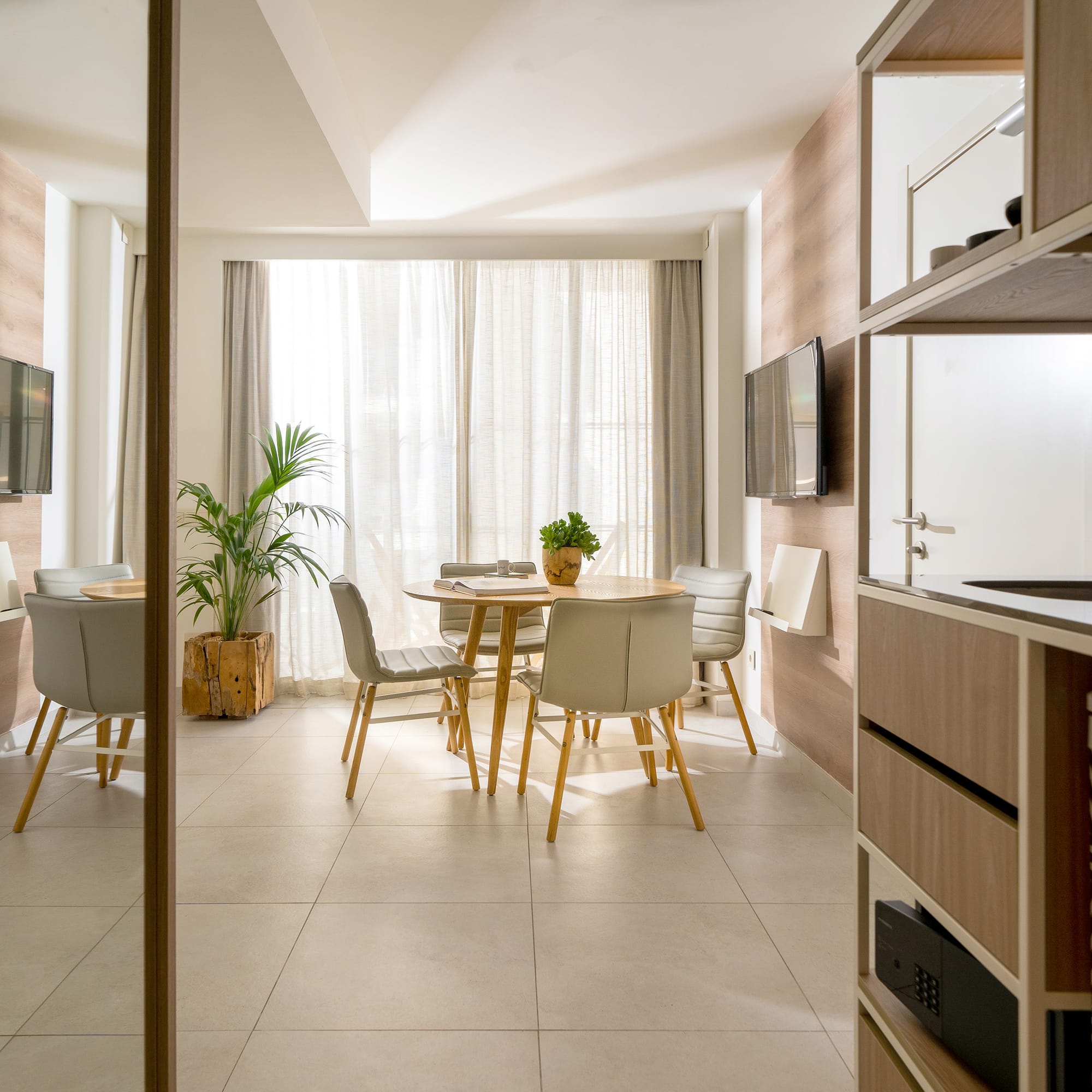 a room with a table and chairs