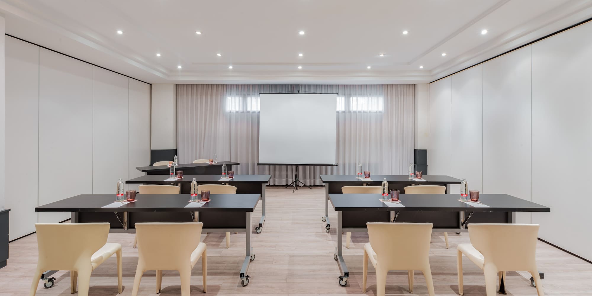 a room with tables and chairs