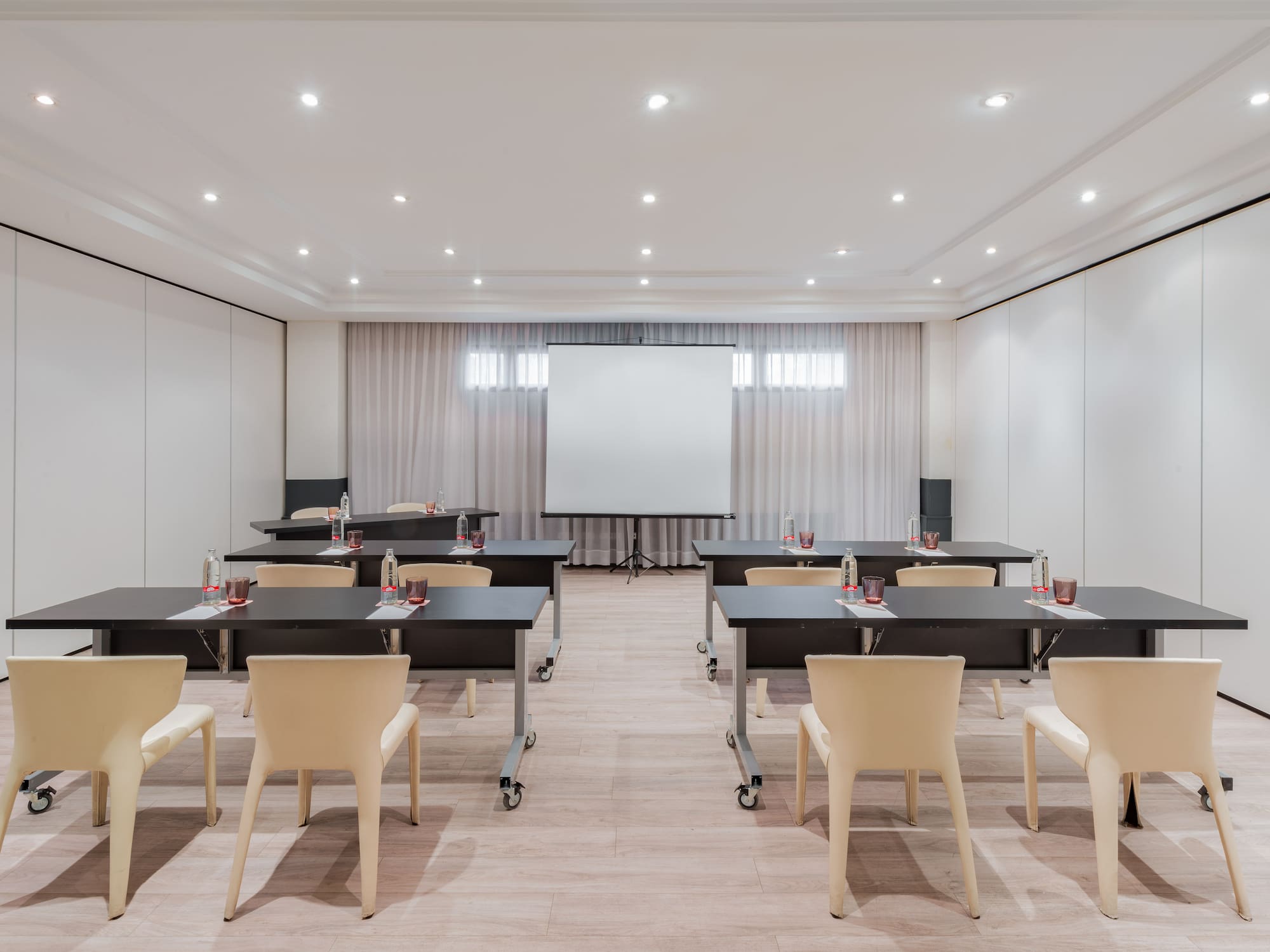 a room with tables and chairs