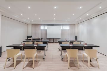 a room with tables and chairs