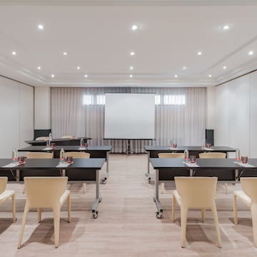 a room with tables and chairs