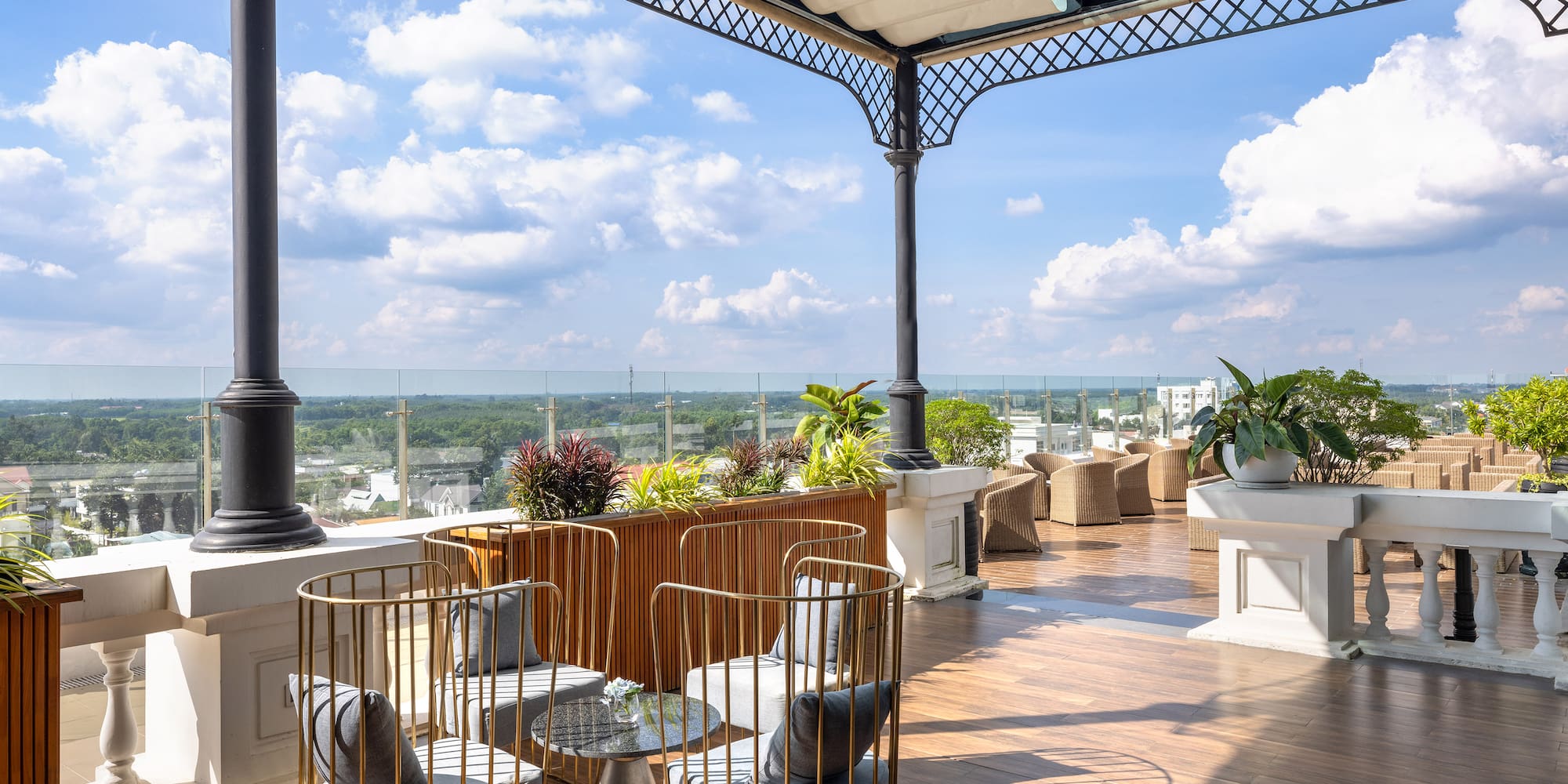 a patio with chairs and a table