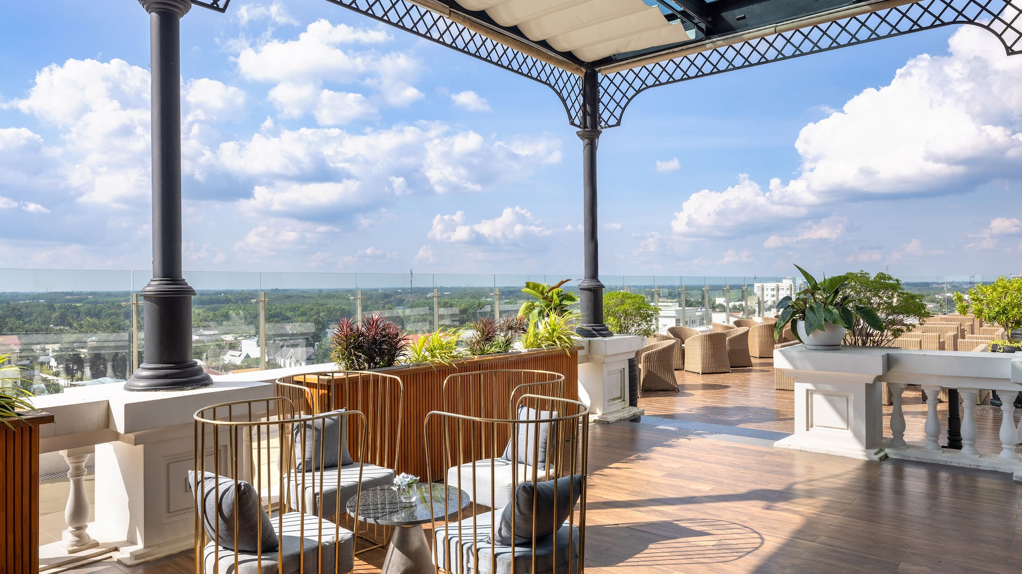 a patio with chairs and a table