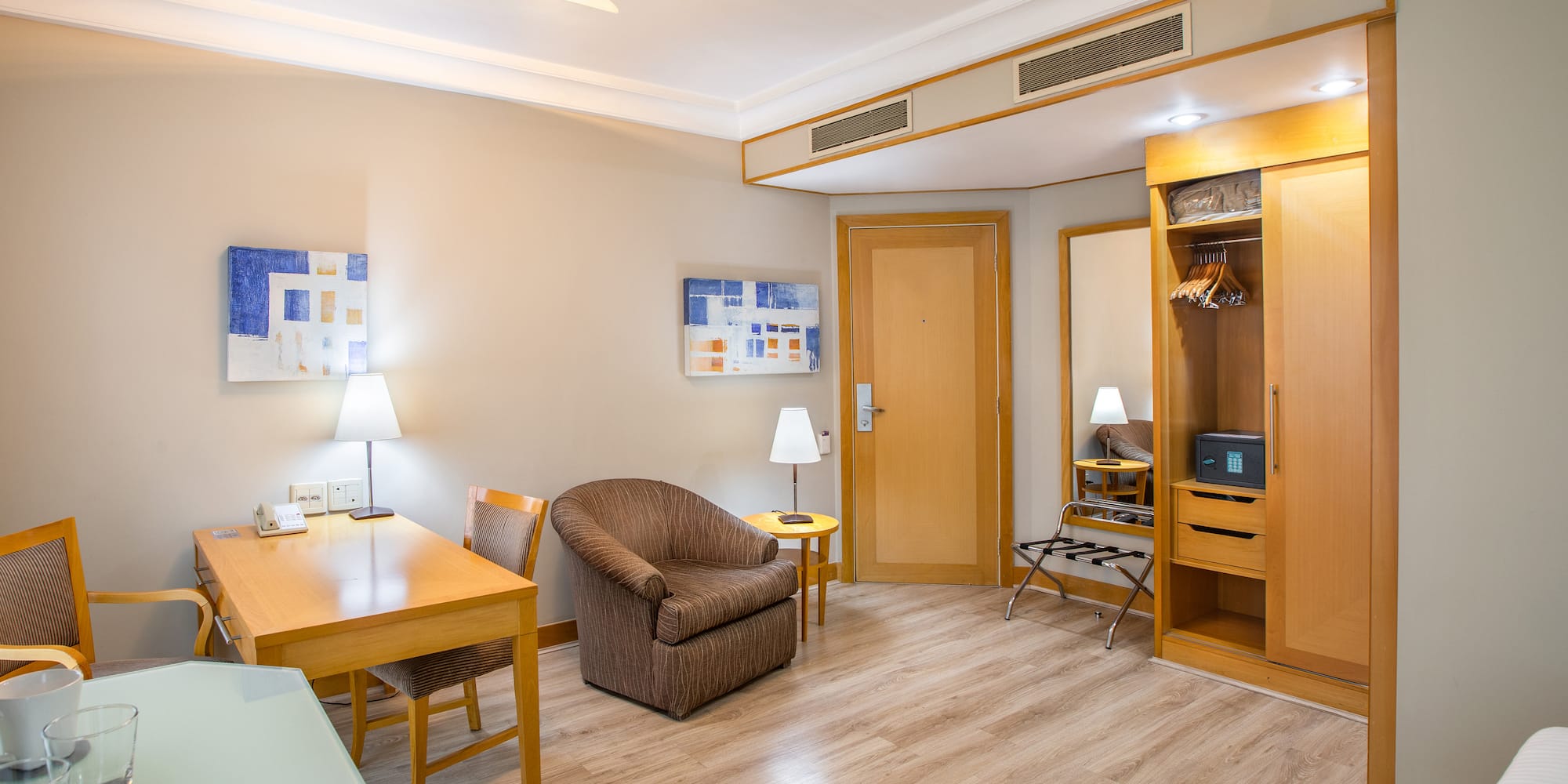 a room with a table and chairs