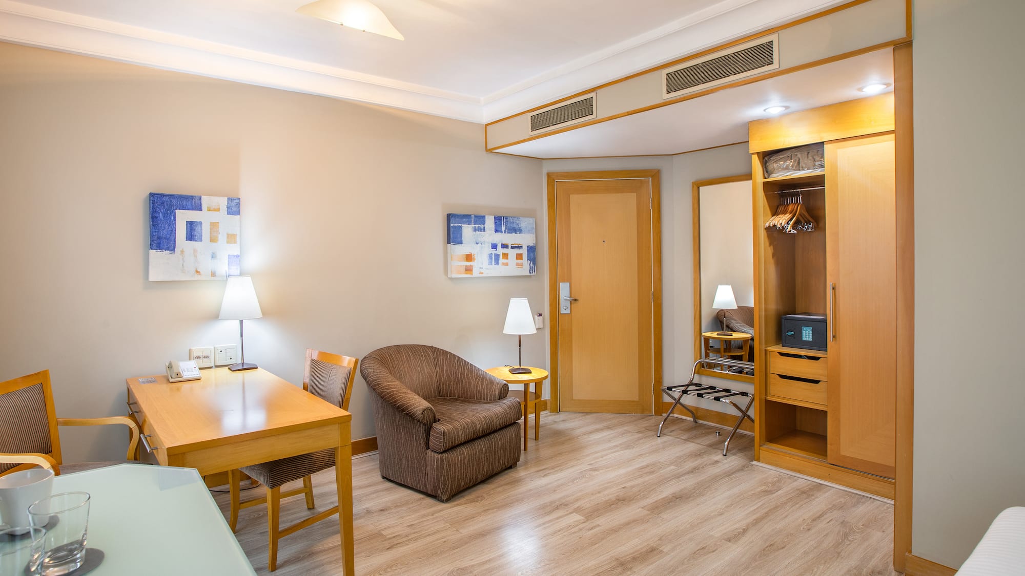 a room with a table and chairs