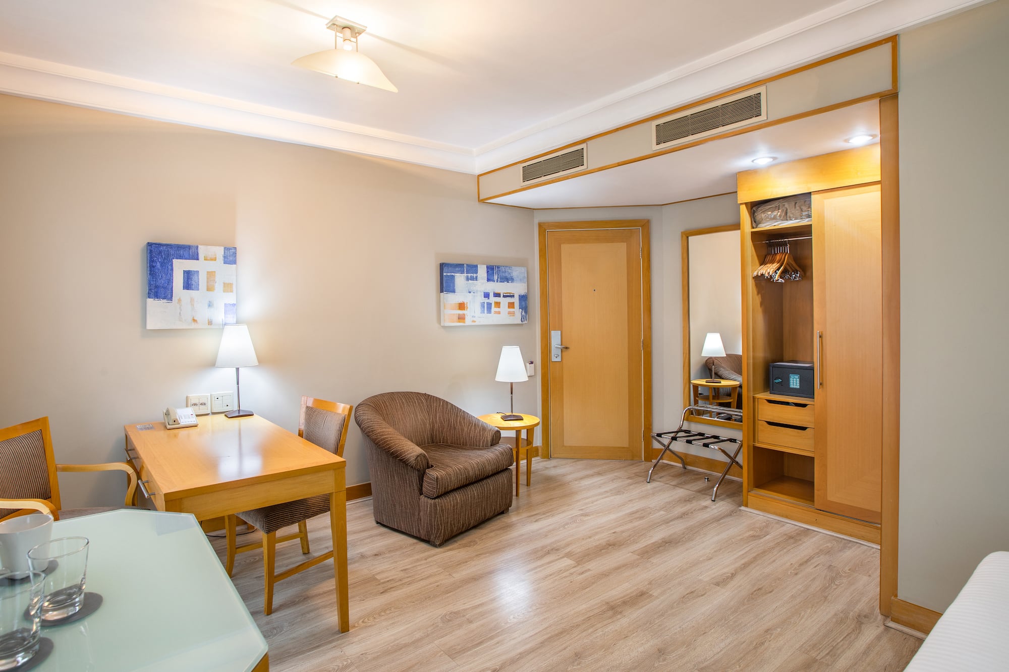 a room with a table and chairs