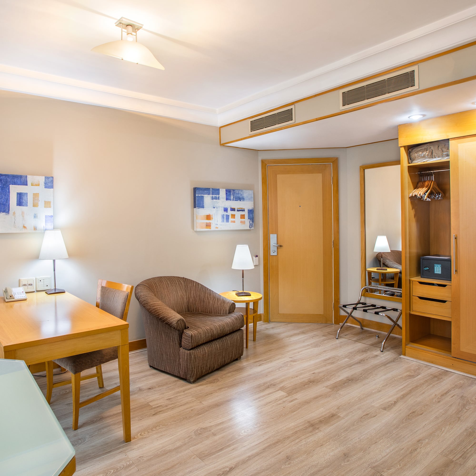 a room with a table and chairs