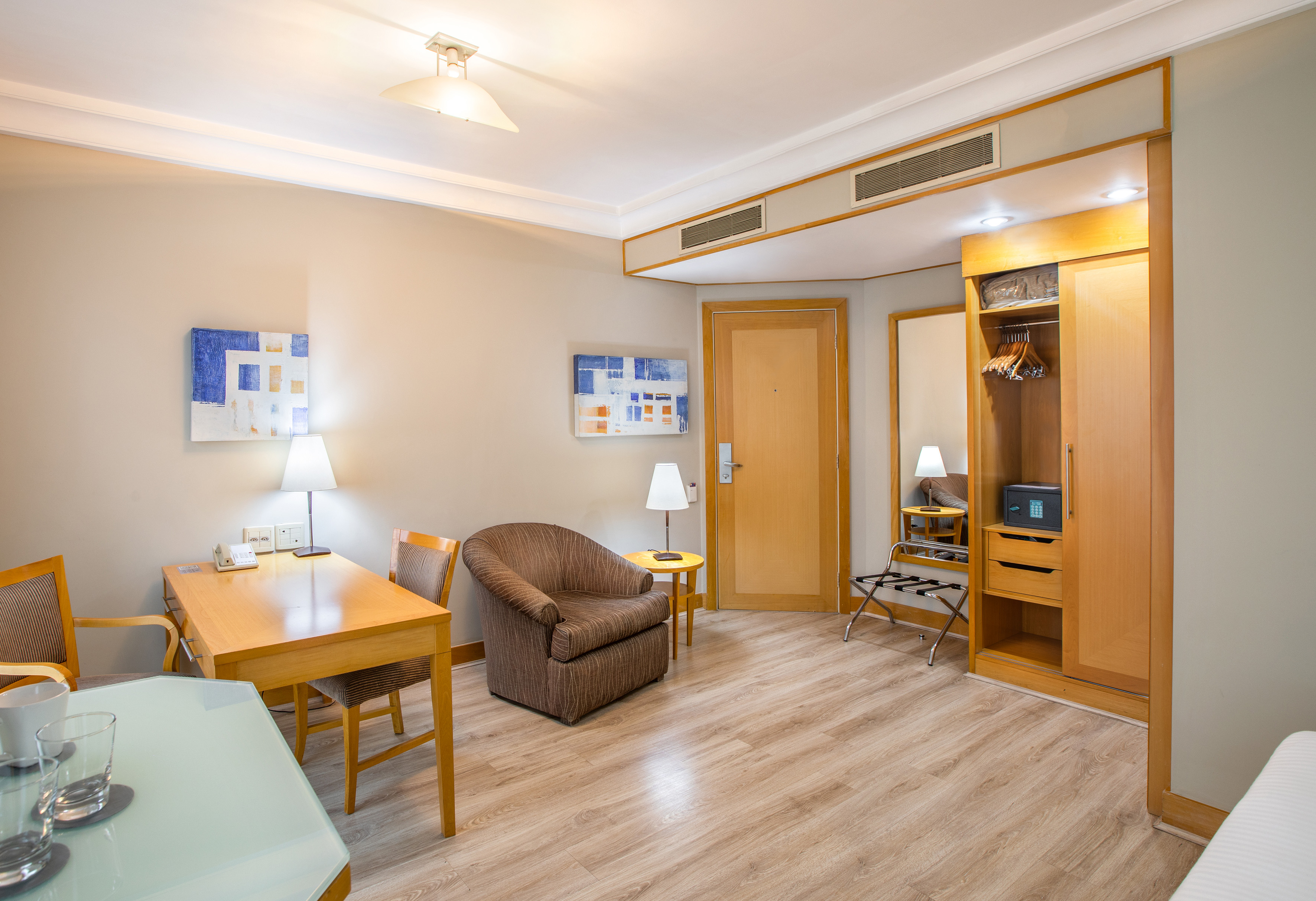 a room with a table and chairs