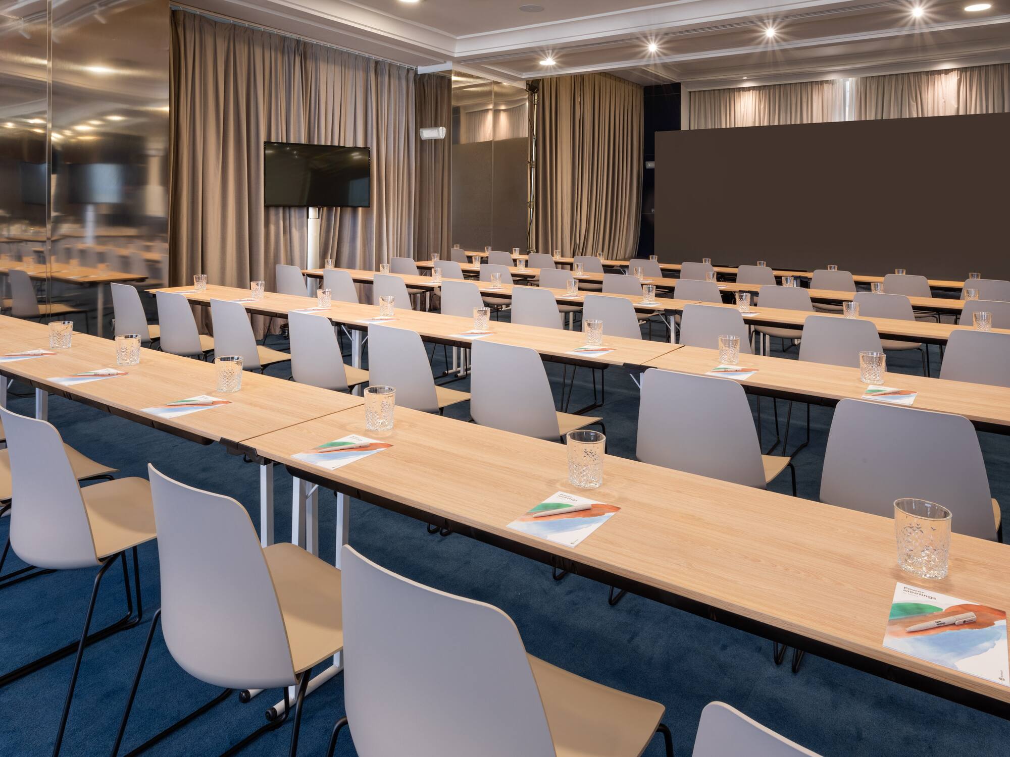 a room with tables and chairs