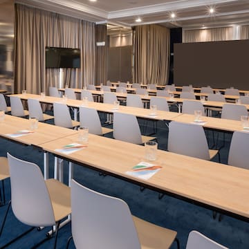 a room with tables and chairs