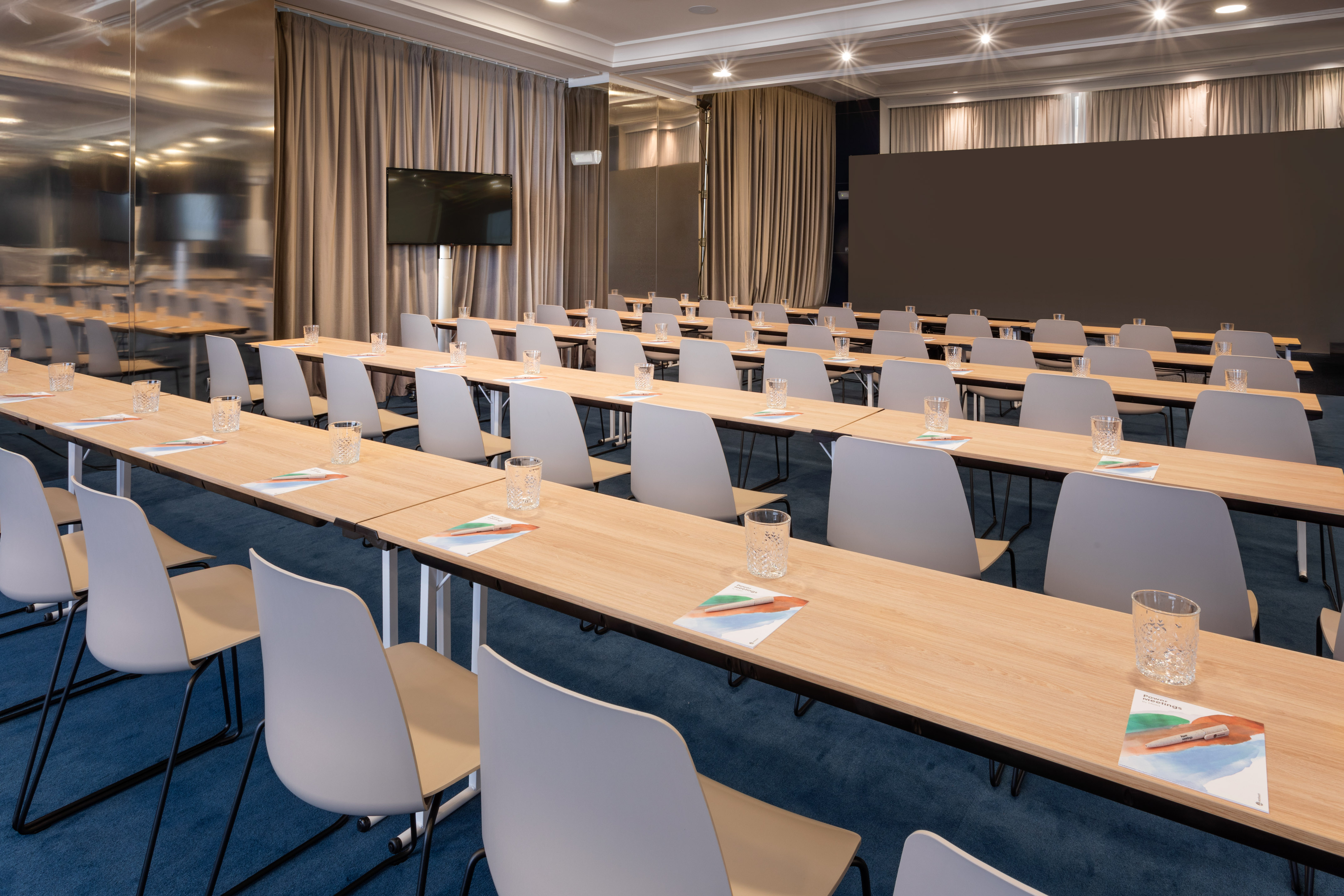 a room with tables and chairs