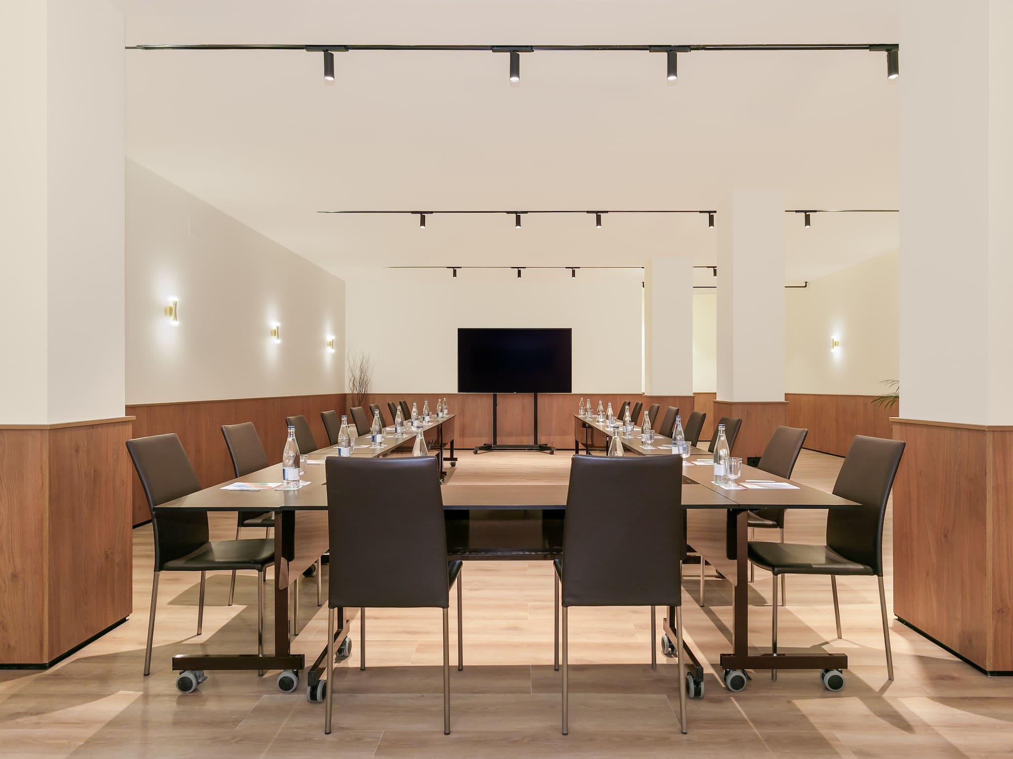 a room with a table and chairs