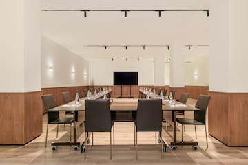 a room with a table and chairs