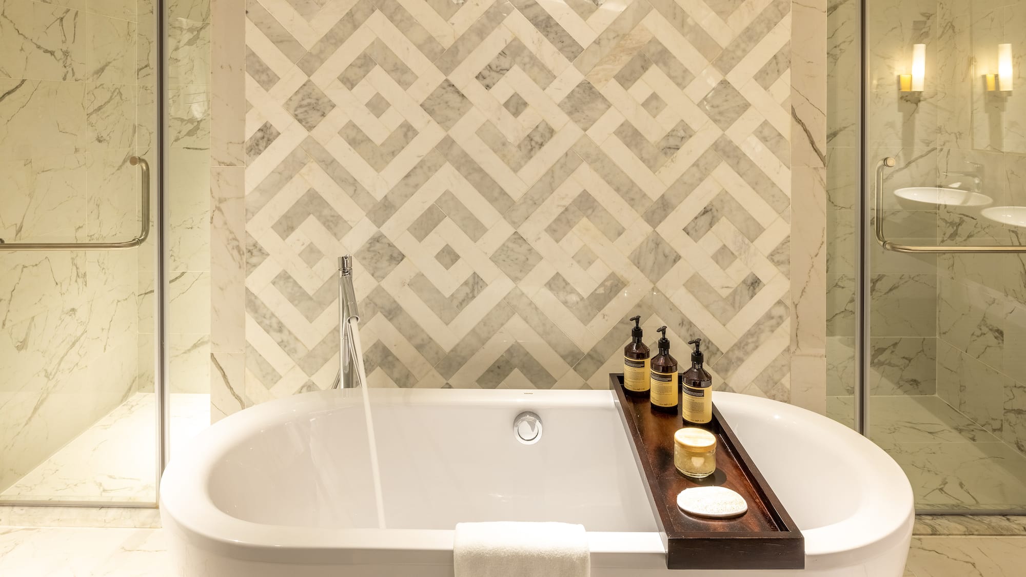 a bathtub with bottles on it