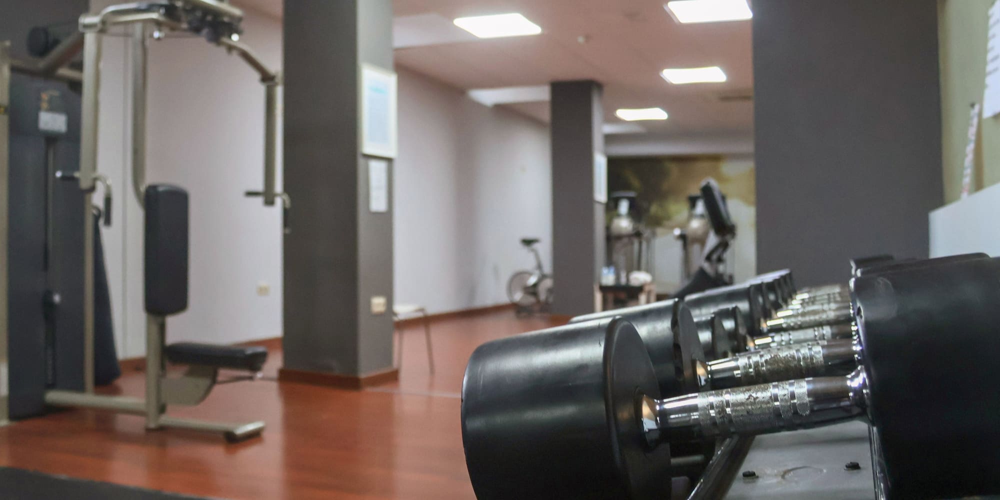 a gym with weights and exercise equipment