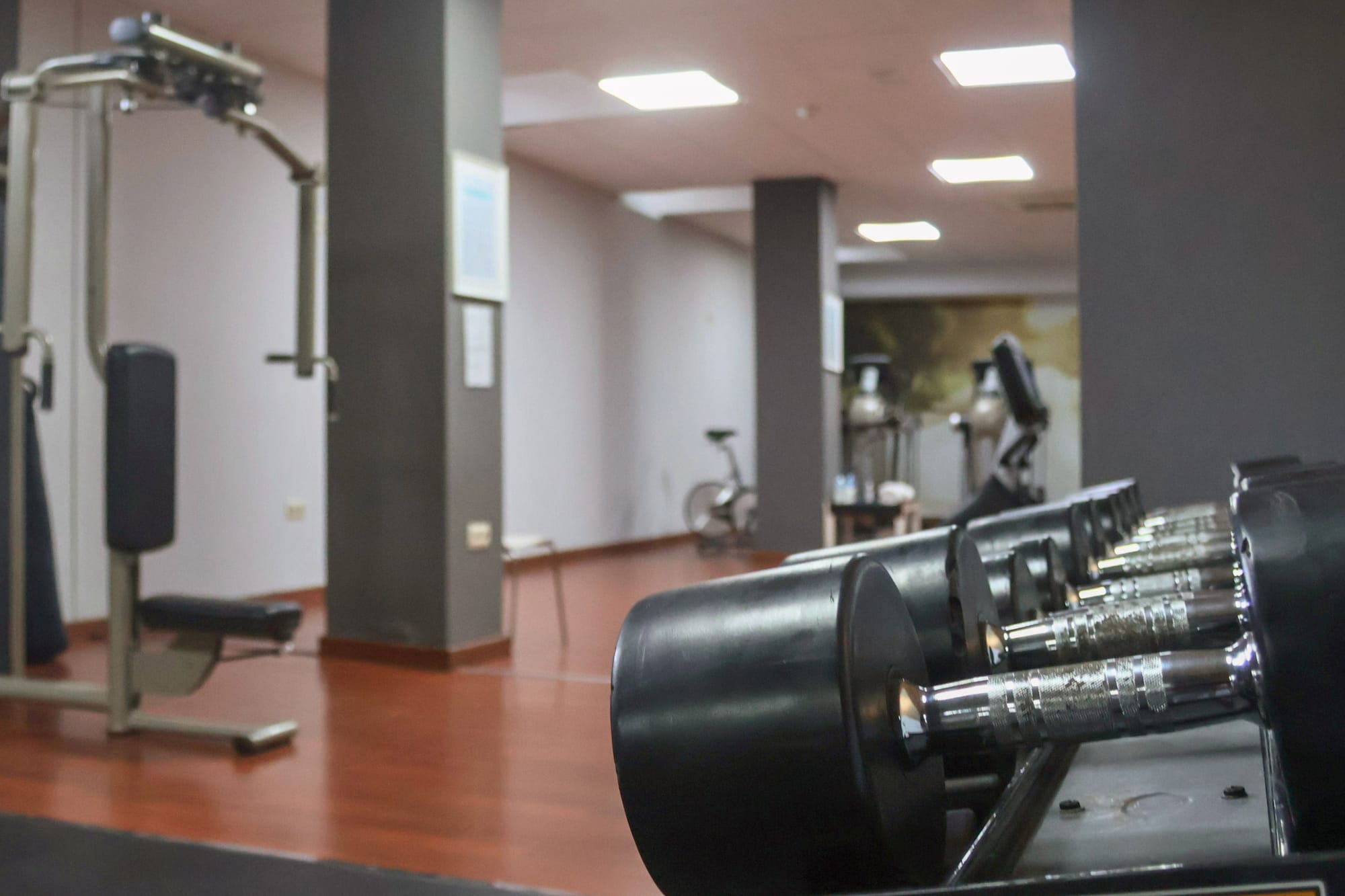 a gym with weights and exercise equipment