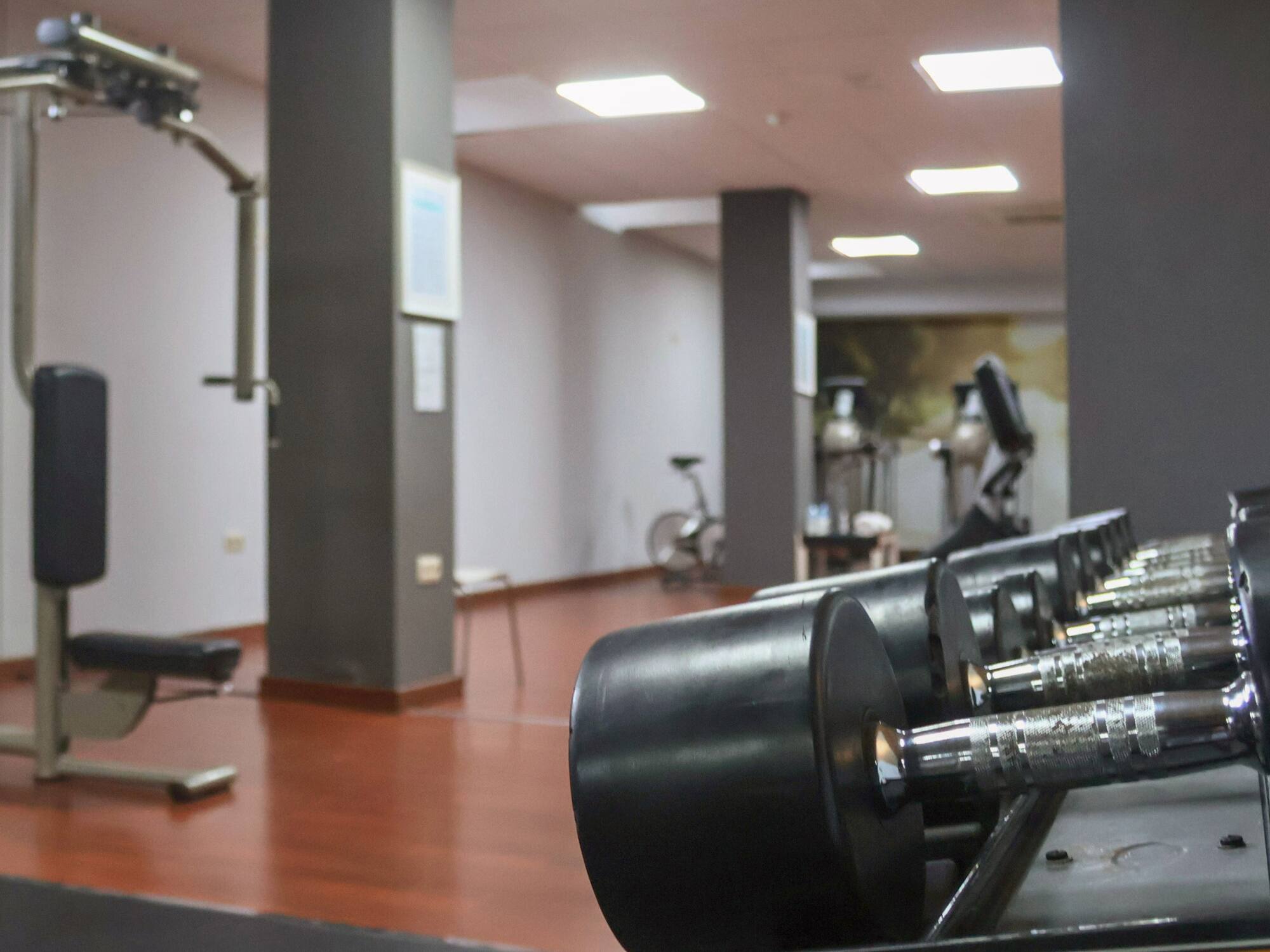 a gym with weights and exercise equipment