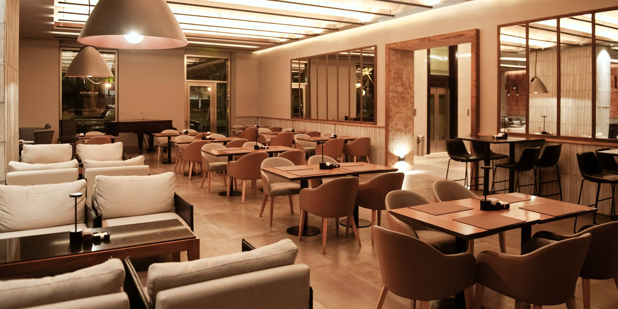 a room with tables and chairs