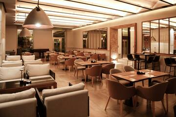 a room with tables and chairs