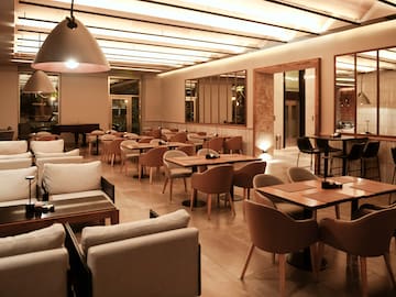 a room with tables and chairs