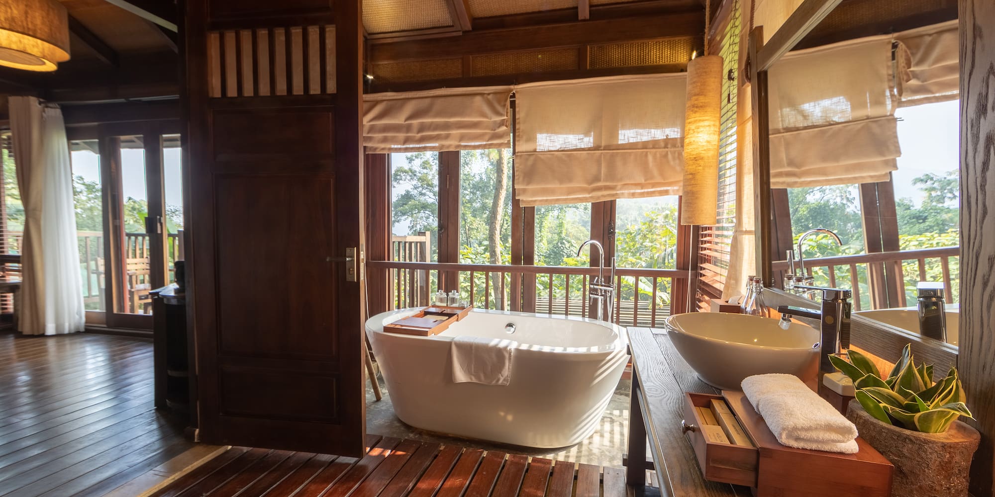 a bathroom with a tub and sink