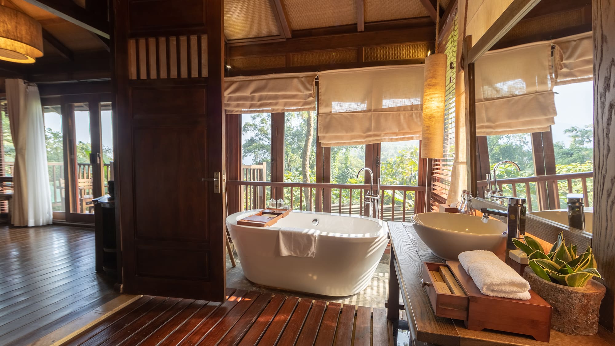 a bathroom with a tub and sink