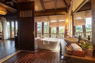 a bathroom with a tub and sink
