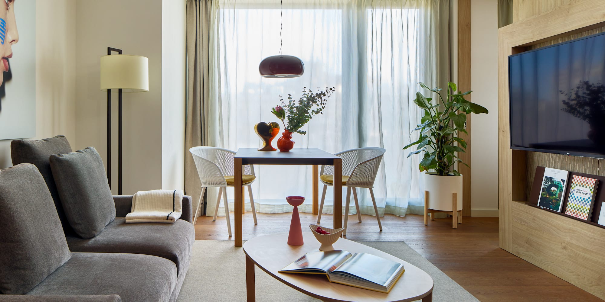 a living room with a couch and table