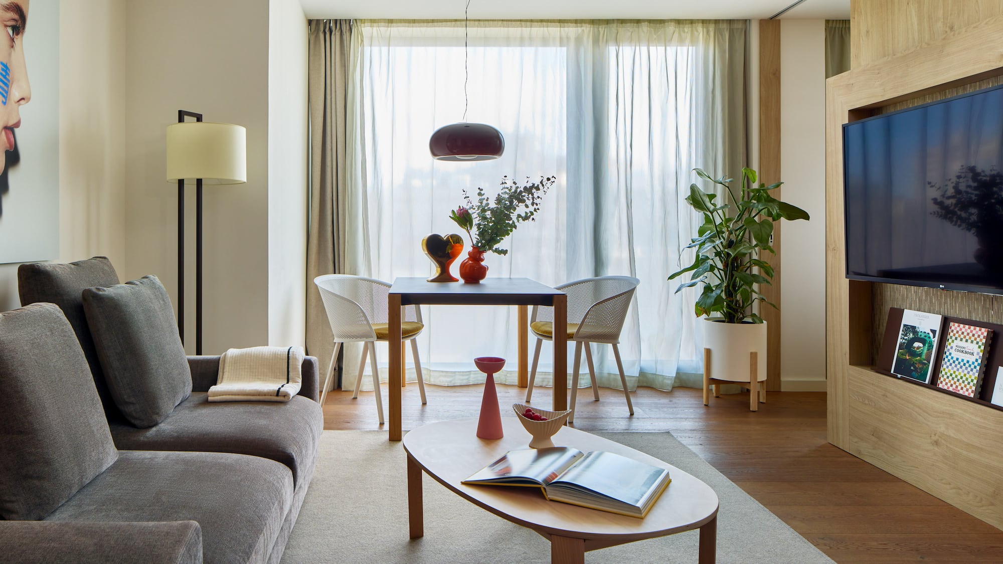 a living room with a couch and table