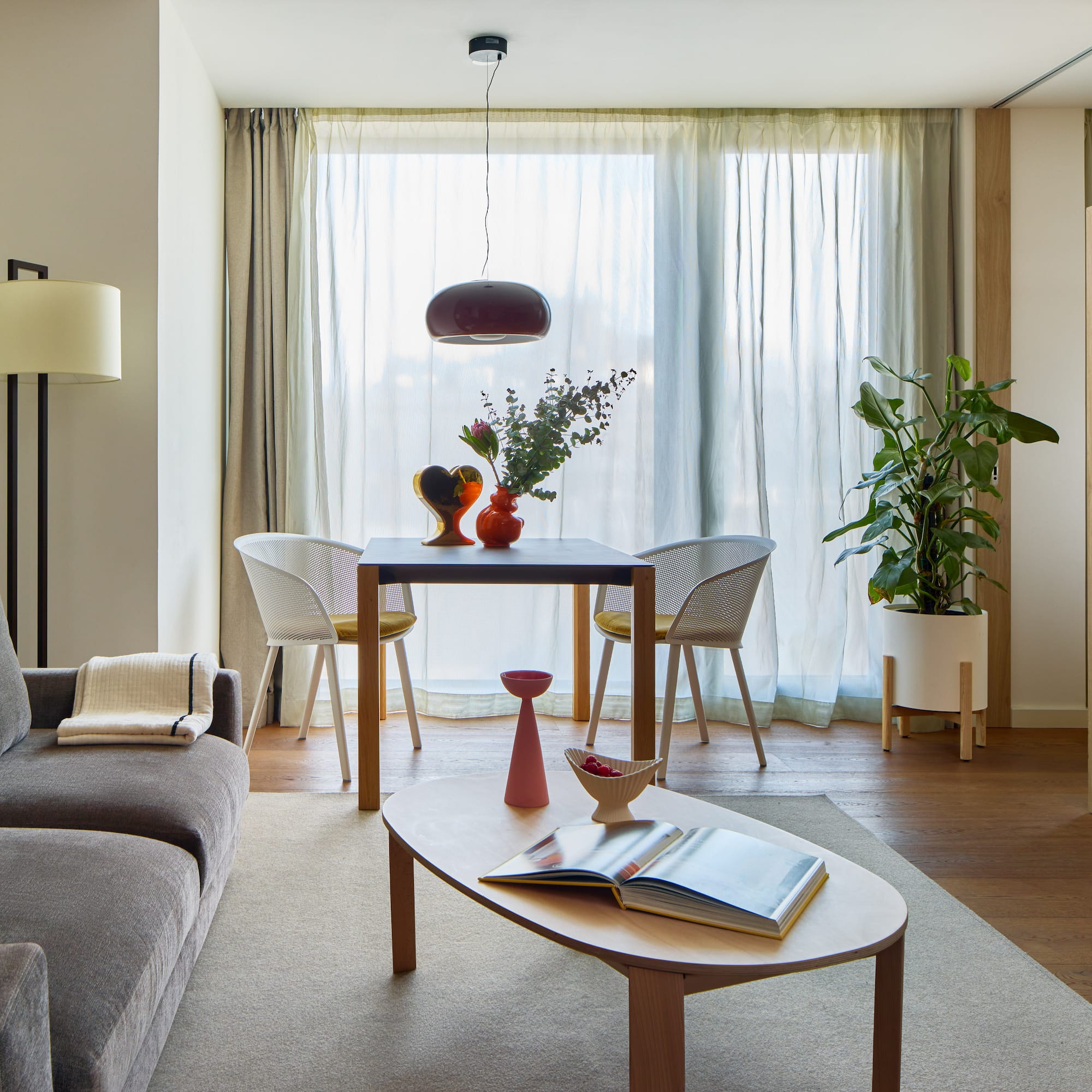 a living room with a couch and table