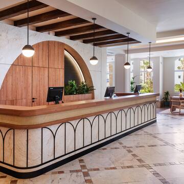 a reception desk in a hotel