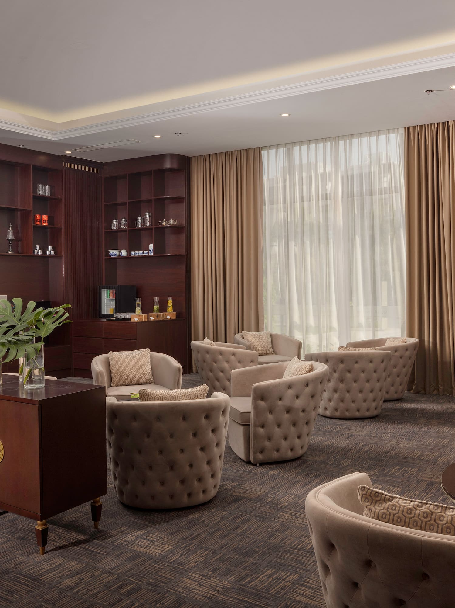 a room with a large table and chairs