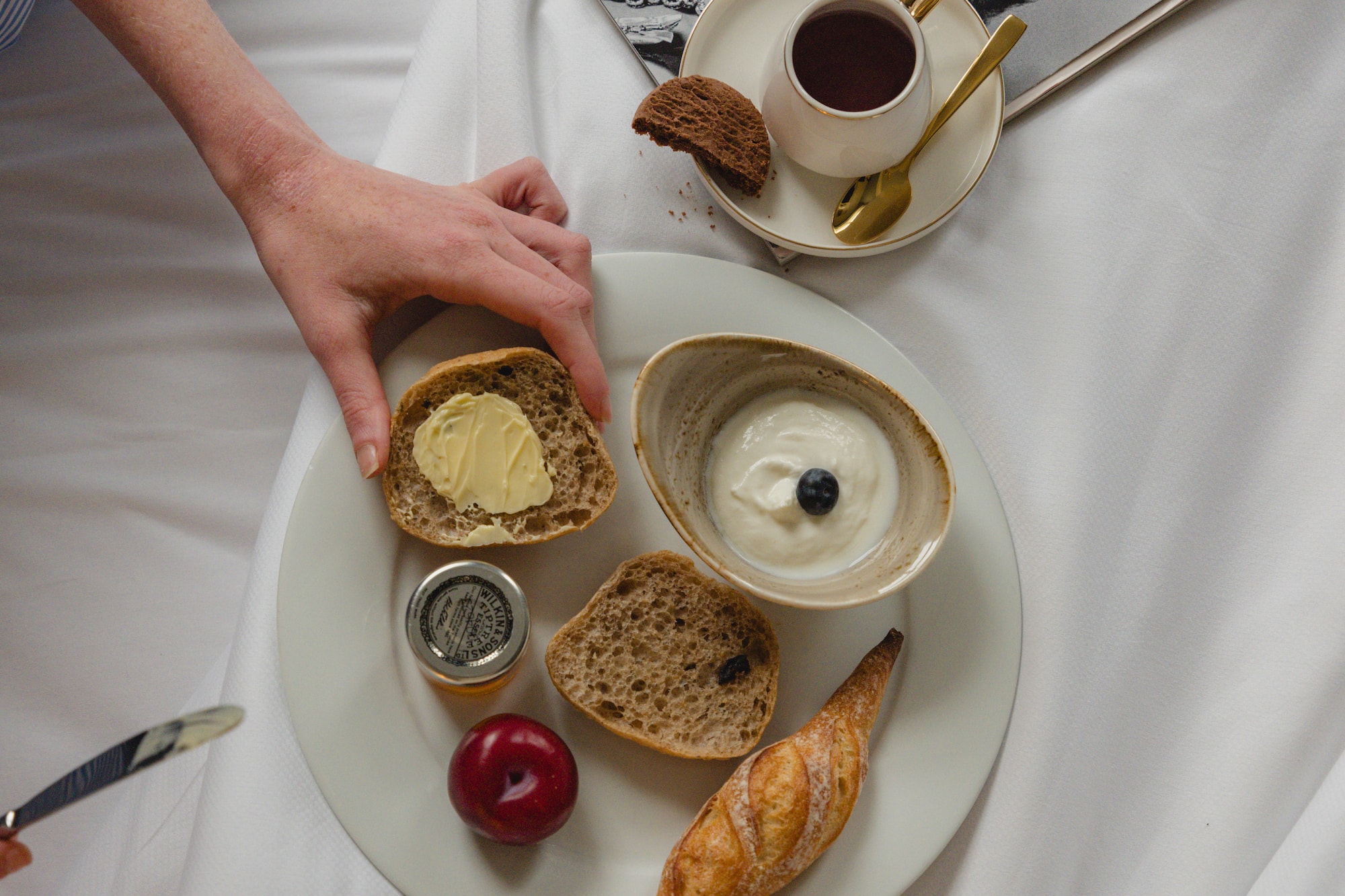 a plate of food on a bed