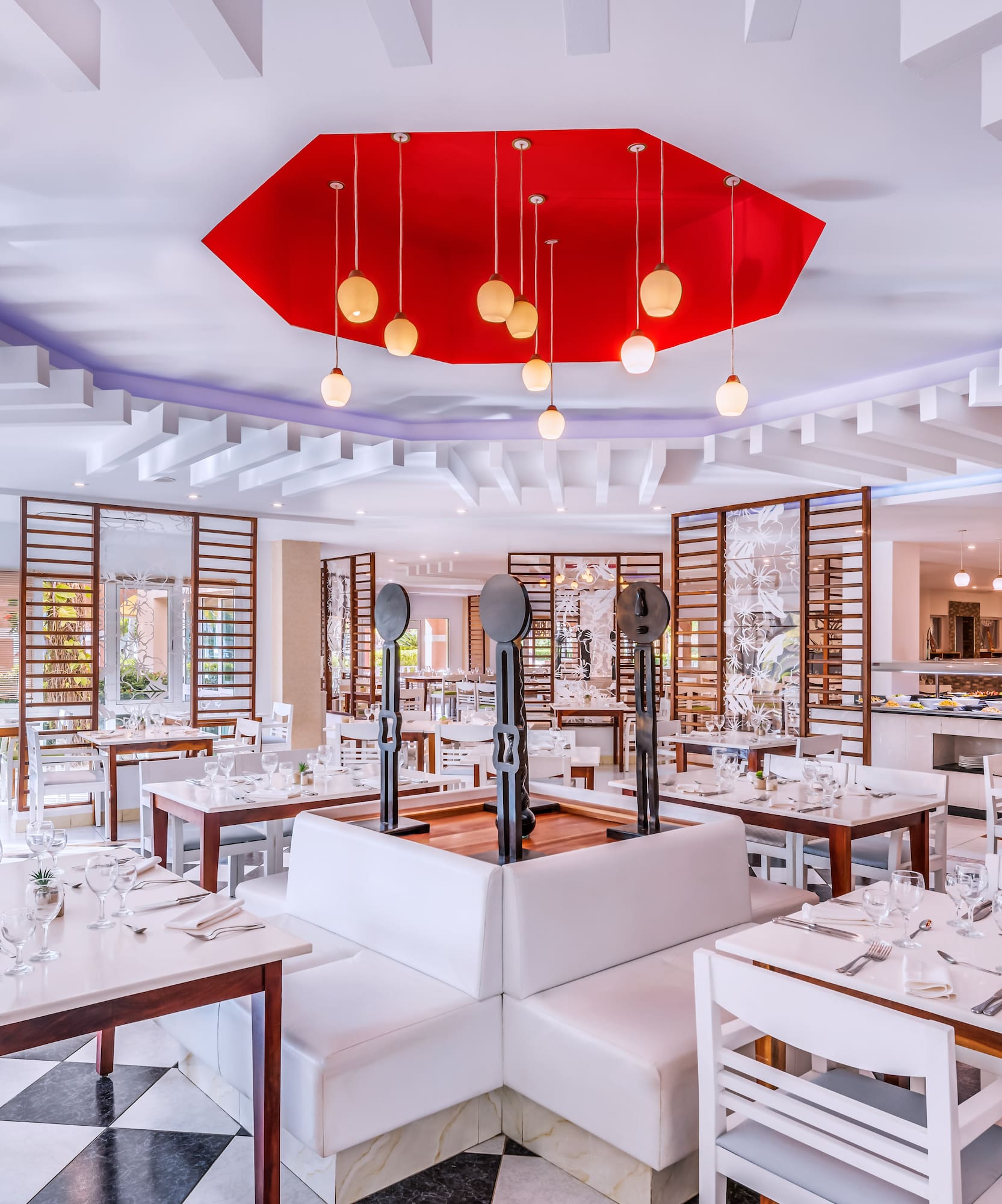 a restaurant with tables and chairs