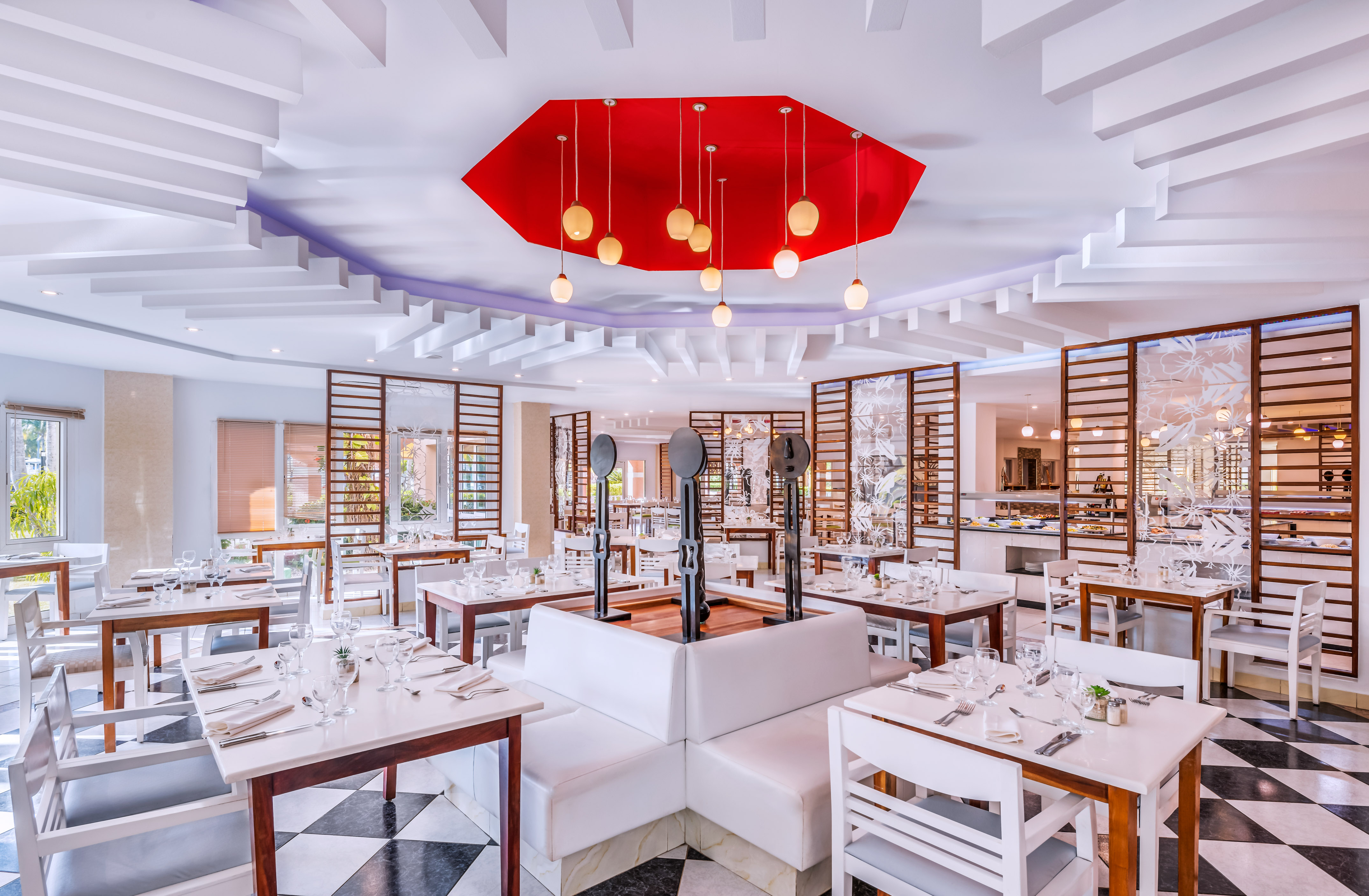 a restaurant with tables and chairs