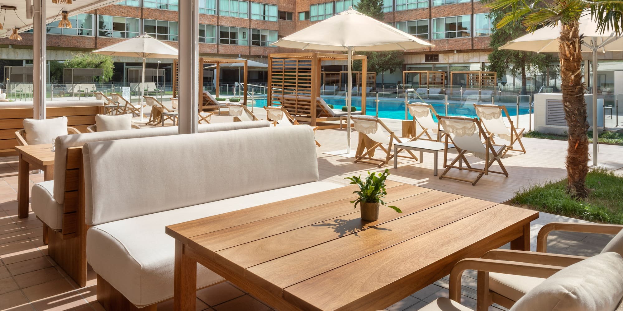 a pool with chairs and a table