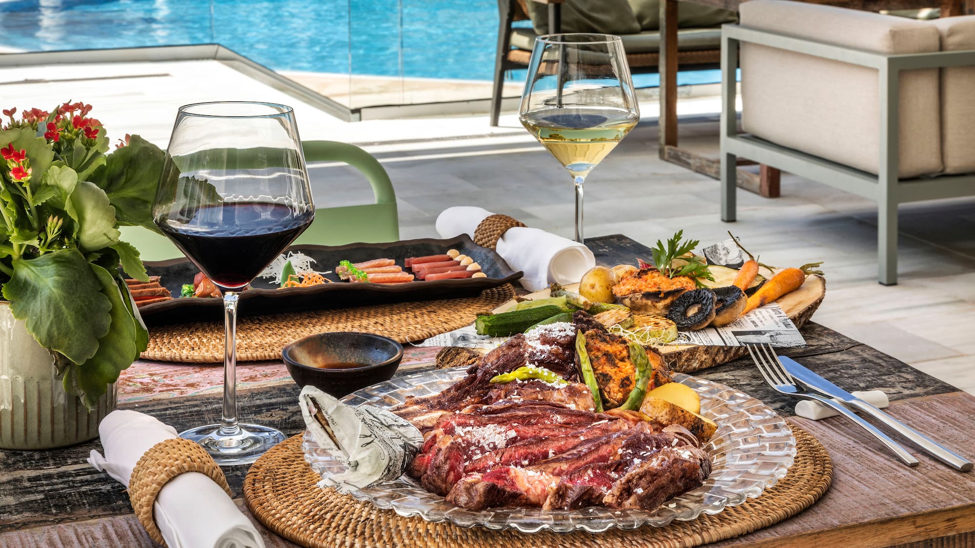 a table with food and wine glasses on it