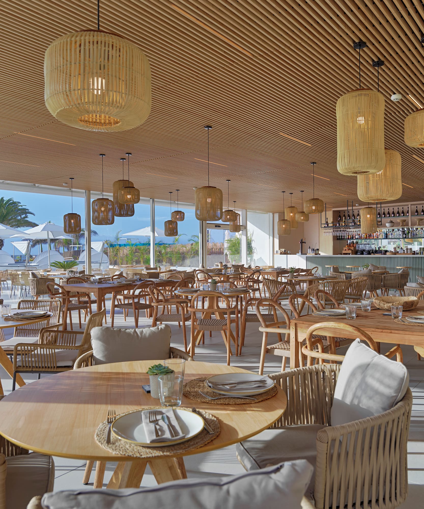 a restaurant with tables and chairs