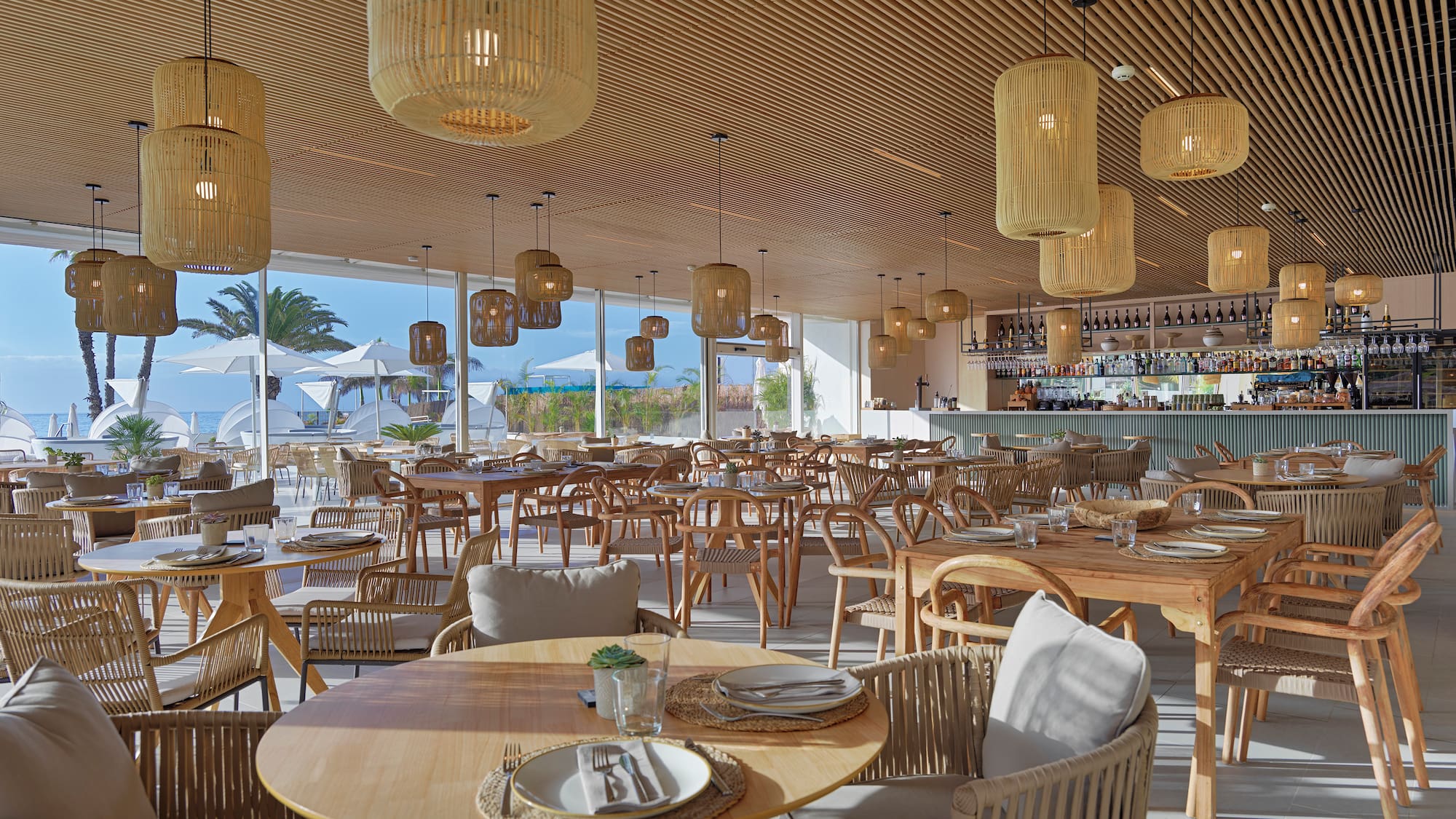 a restaurant with tables and chairs